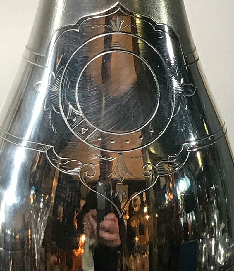 A RARE SILVER PLATED CHAMPAGNE BOTTLE COCKTAIL SHAKER