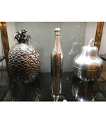 A RARE SILVER PLATED CHAMPAGNE BOTTLE COCKTAIL SHAKER