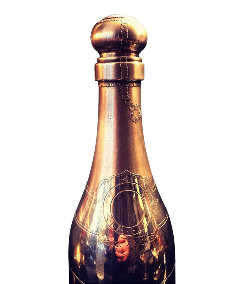 A RARE SILVER PLATED CHAMPAGNE BOTTLE COCKTAIL SHAKER