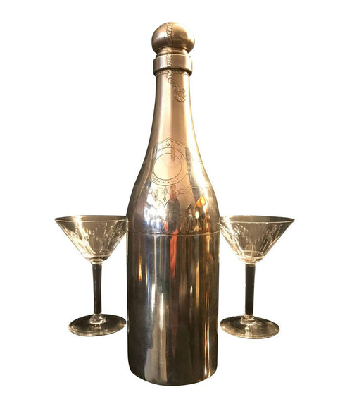 A RARE SILVER PLATED CHAMPAGNE BOTTLE COCKTAIL SHAKER