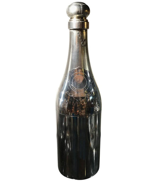 A RARE SILVER PLATED CHAMPAGNE BOTTLE COCKTAIL SHAKER