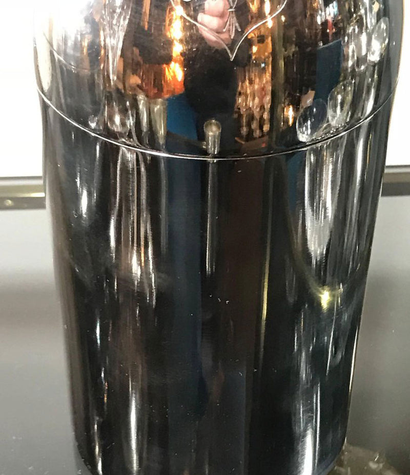 A RARE SILVER PLATED CHAMPAGNE BOTTLE COCKTAIL SHAKER