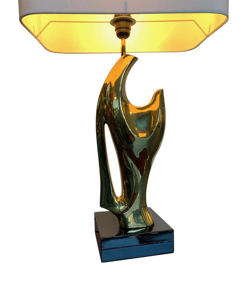 A 1970S SCULPTURAL LAMP IN THE STYLE OF ALAIN CHERVET WITH BLACK LACQUERED BASE
