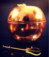 AN APPLE SHAPED COPPER ICE BUCKET