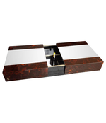 AN ERIC MAVILLE SLIDING COFFEE TABLE WITH HIDDEN BAR