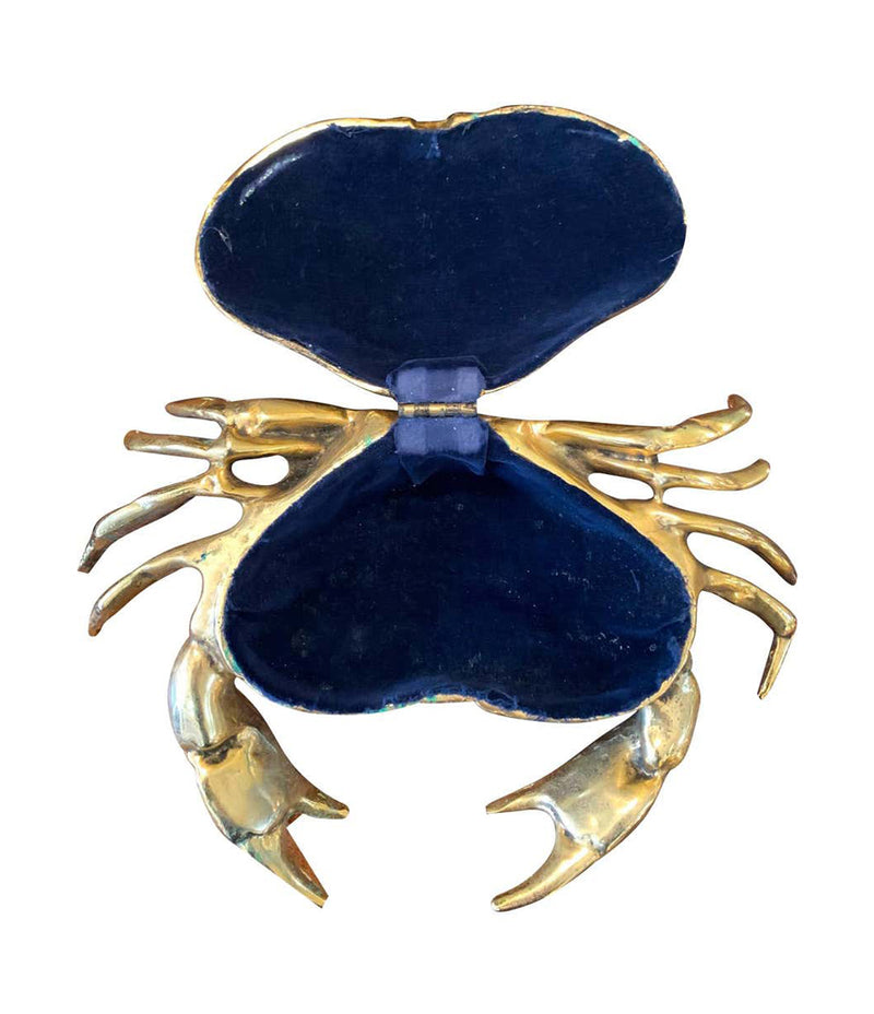 A FONDICA SOLID CAST CRAB WITH HINGED TOP SHELL WITH BLUE VELVET LINING