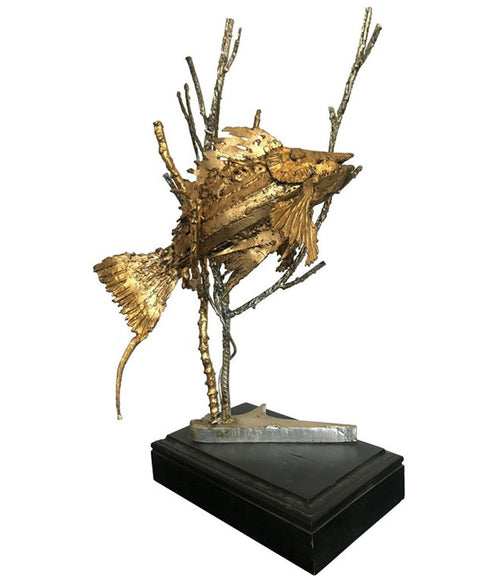 BRUTALIST FISH SCULPTURE ON A BLACK WOODEN PLINTH