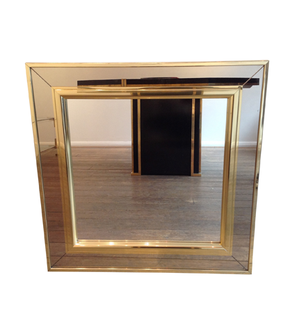 A BRASS MIRROR