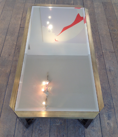 A BRASS COFFEE TABLE