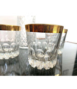 CRYSTAL AND GILT COCKTAIL SET WITH SHAKER AND SIX MATCHING GILT EDGED TUMBLERS