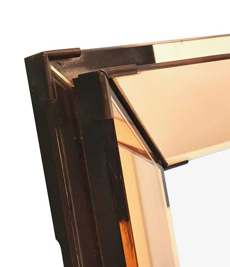 FRENCH ART DECO ROSE COLORED MIRROR WITH BRASS CORNERS