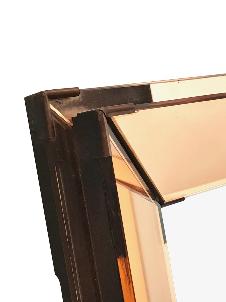 FRENCH ART DECO ROSE COLORED MIRROR WITH BRASS CORNERS