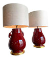 LARGE PAIR OF MIDCENTURY SANG DE BOEUF VASE LAMPS WITH RAMS HEAD HANDLES