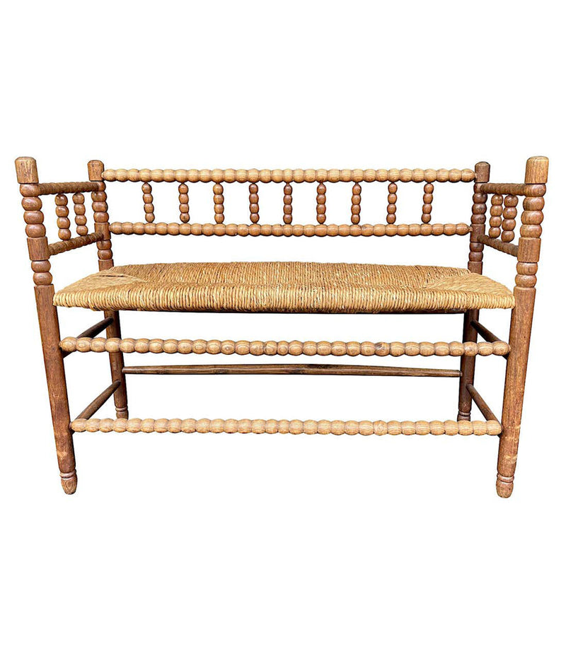 LOVELY 1890S ENGLISH OAK AND ELM BOBBIN BENCH SEAT WITH RUSH WOVEN SEAT