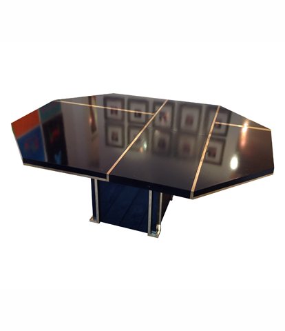 A BLACK MAHEY DINING TABLE