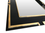 MAISON JANSEN STYLE BLACK LUCITE MIRROR WITH BRASS DETAIL