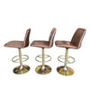 SET OF THREE 1970S SWIVEL BAR STOOLS BY JOHANSON DESIGN WITH GILT METAL BASES