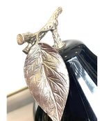 SWISS CHROMED AND BLACK PEAR SHAPED ICE BUCKET BY FREDDOTHERM WITH LEAF HANDLE