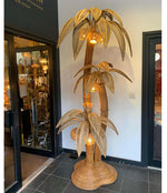 VERY LARGE BAMBOO AND RATTAN 3 STEMMED FLOOR LAMP WITH SEVEN COCONUT LIGHTS