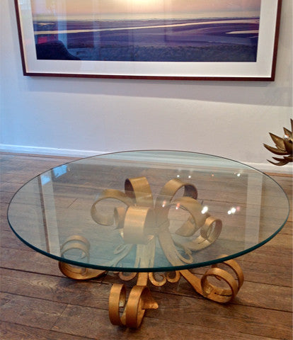 A GILT HOLLYWOOD COFFEE TABLE