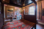 AN AMAZING SCULPTURAL DOUBLE, FOUR POSTER BED BY ARTIST RON HITCHINS DECORATED WITH 3582 UNIQUE HANDMADE CERAMIC TILES