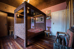 AN AMAZING SCULPTURAL DOUBLE, FOUR POSTER BED BY ARTIST RON HITCHINS DECORATED WITH 3582 UNIQUE HANDMADE CERAMIC TILES